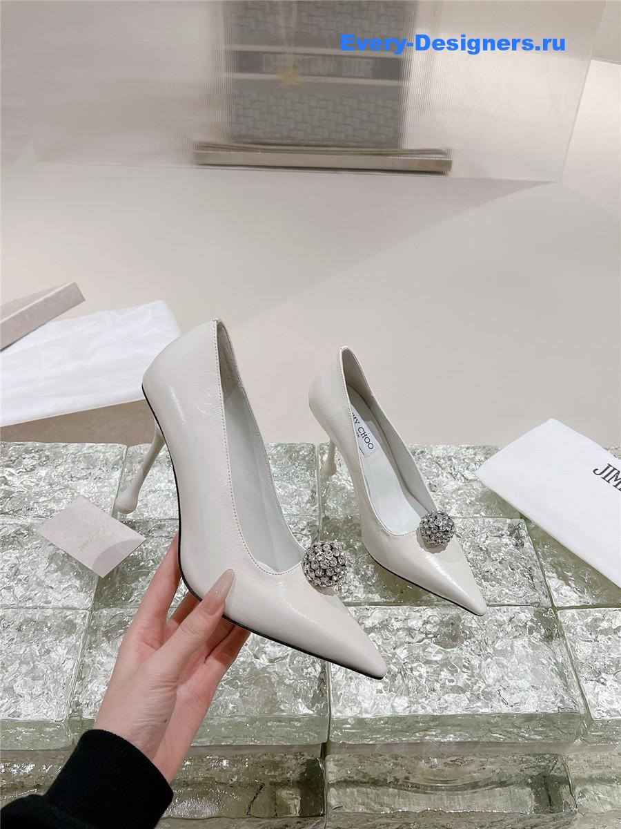 J1m*y Ch00 orb 95 embellished patent leather pumps white