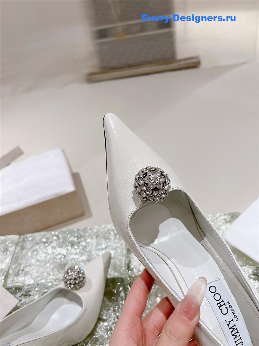 J1m*y Ch00 orb 95 embellished patent leather pumps white