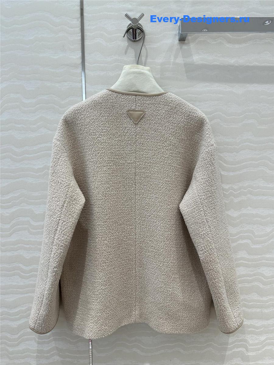 Pra*a woolen sheepskin trim coat