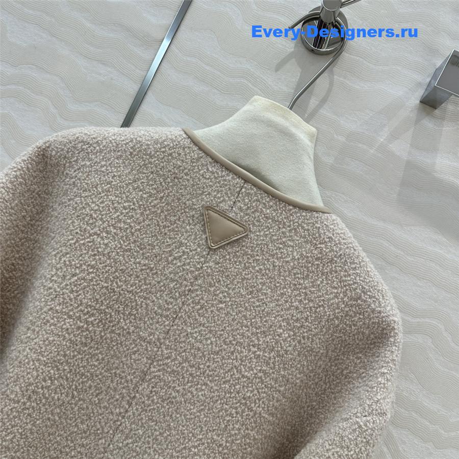 Pra*a woolen sheepskin trim coat