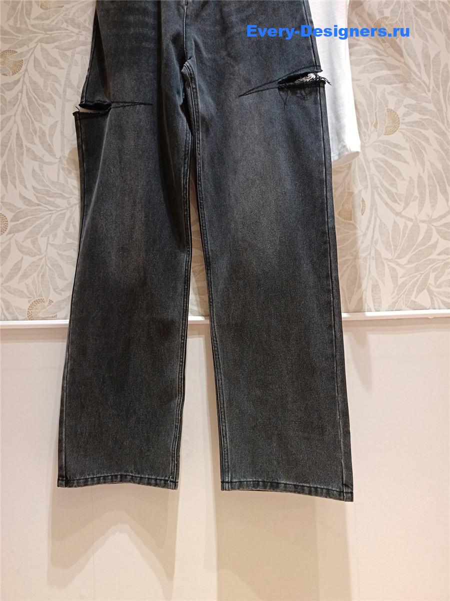 Ce1i*e cutout high-rise tapered jeans