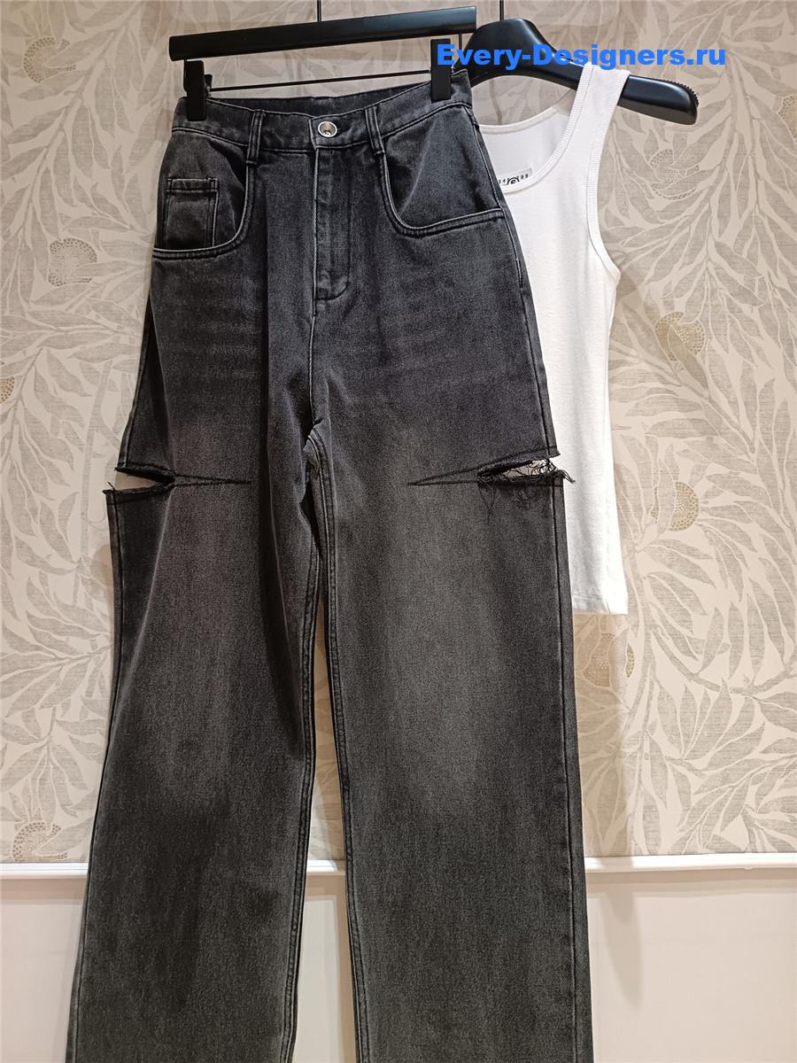 Ce1i*e cutout high-rise tapered jeans