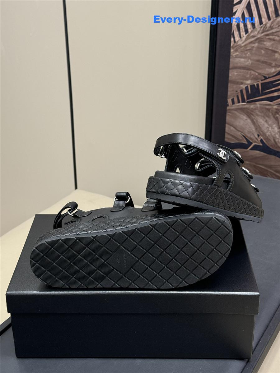 Ch**el black waxed leather sandals