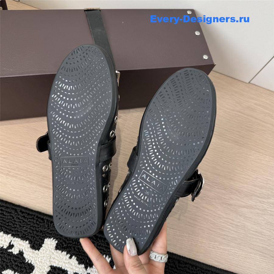 Alaïa black cutout Mary Jane flats