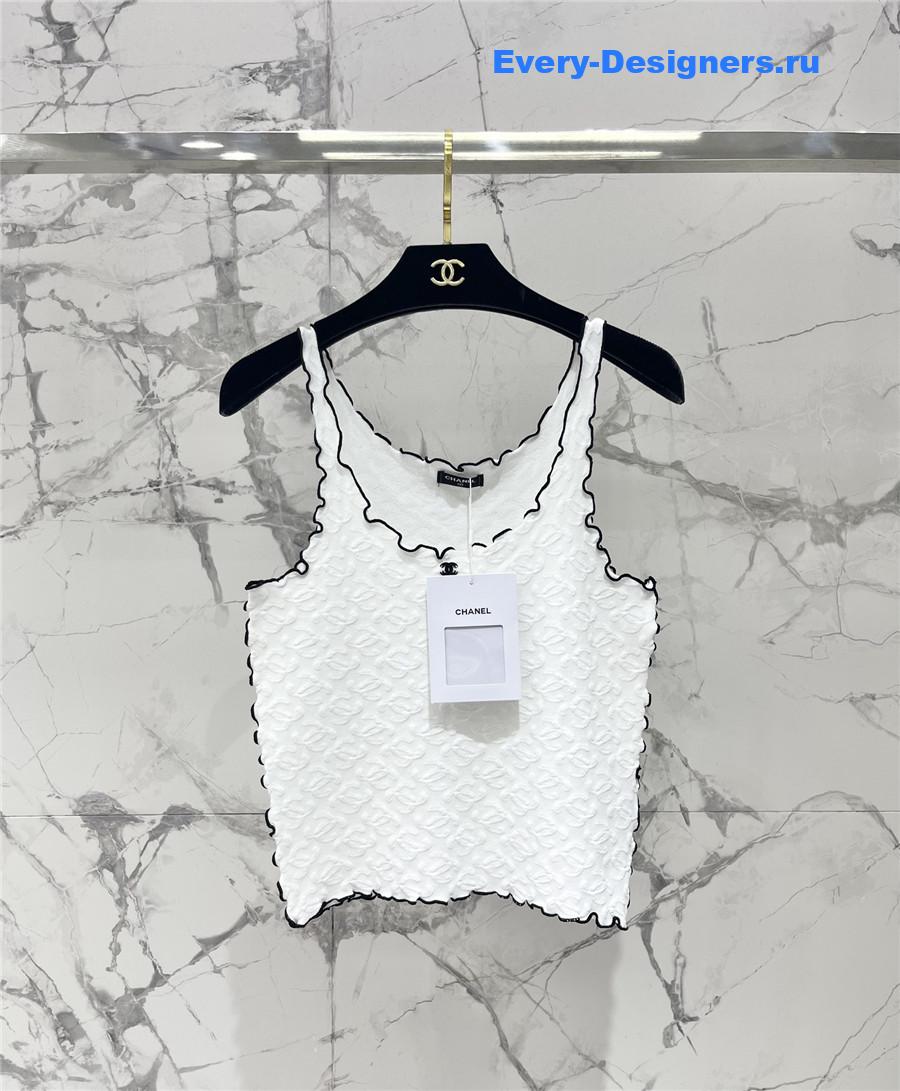 Ch**el embroidered wool-silk top in white