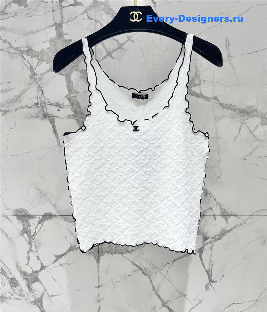 Ch**el embroidered wool-silk top in white