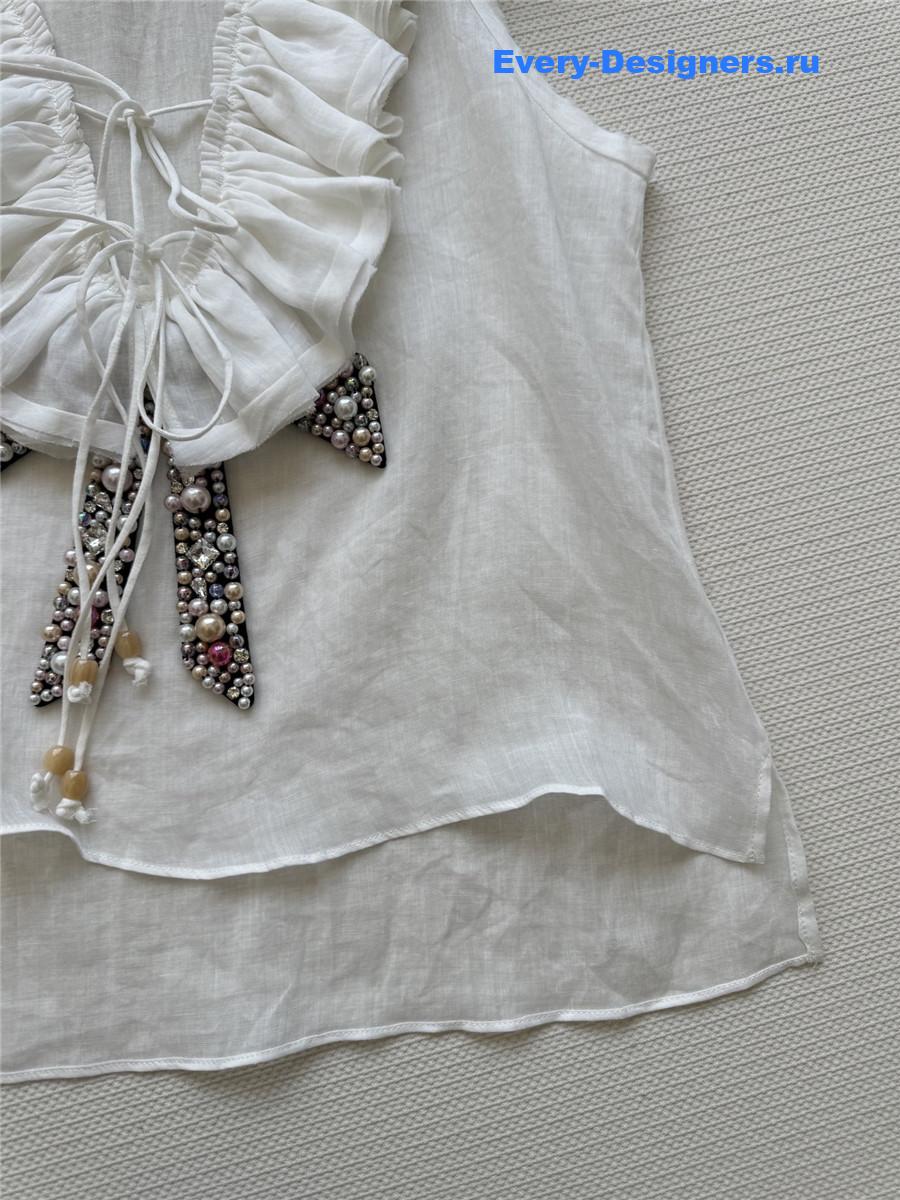 Ch**el beaded bow v-neck top