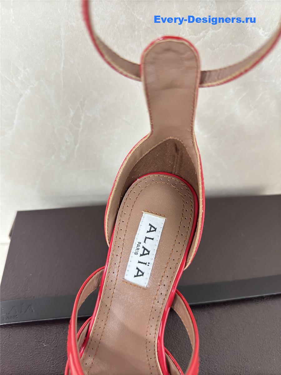 Alaïa Red Fishnet Pumps