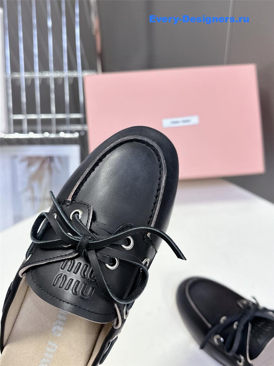 Miu Miu Black Boat Slides