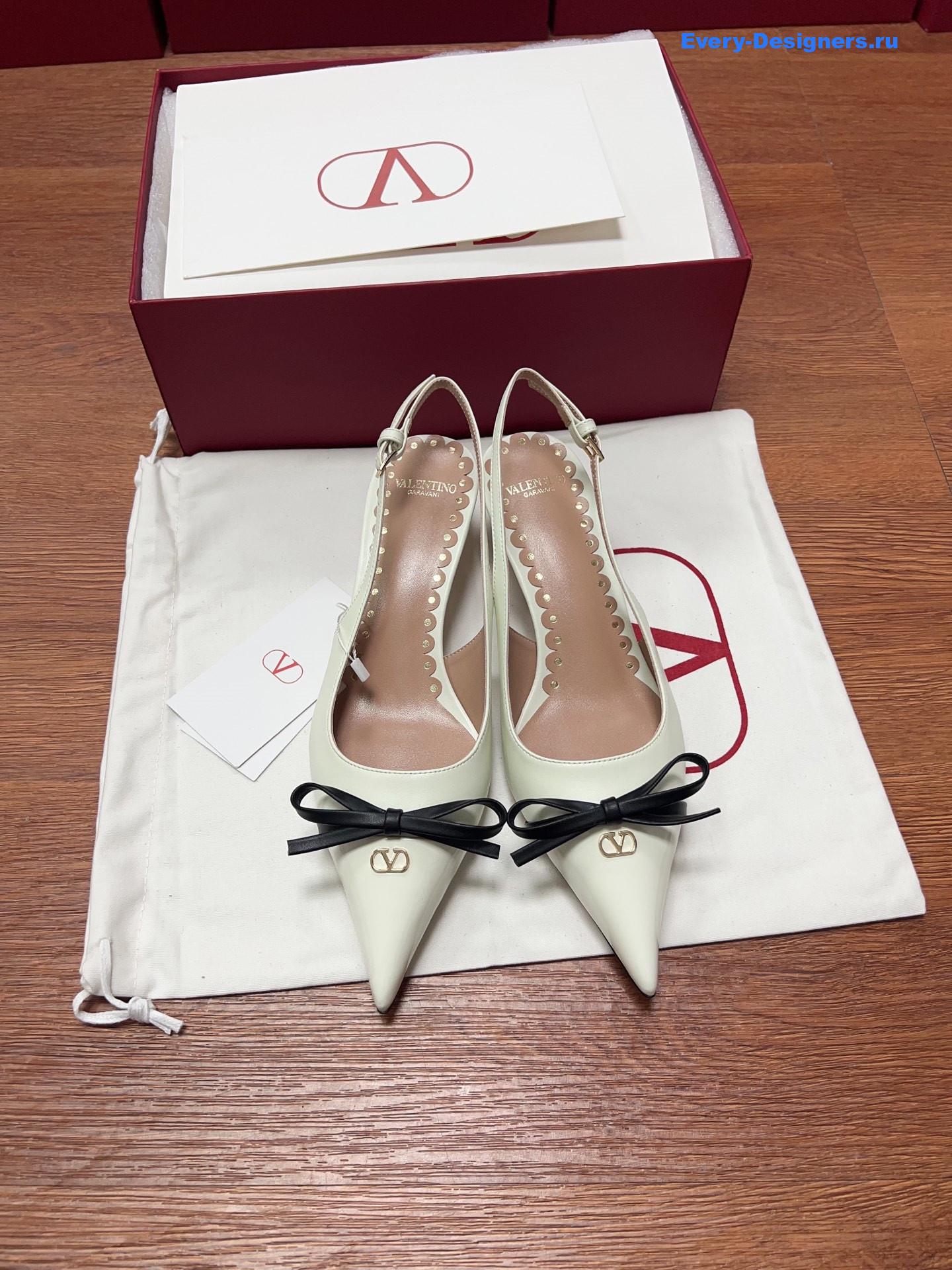 Va1e*ntin0 garavani white bow slingback pumps