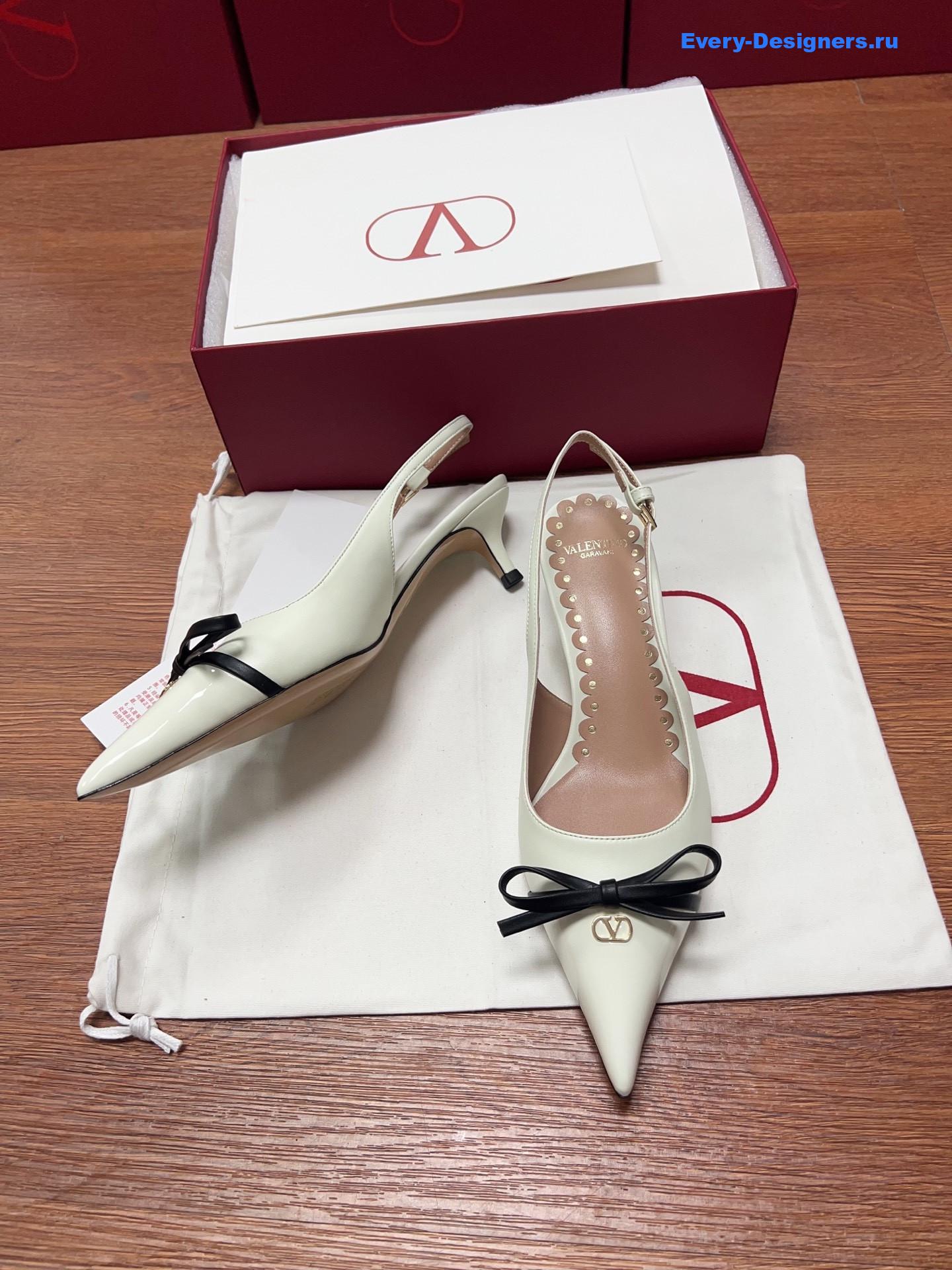 Va1e*ntin0 garavani white bow slingback pumps