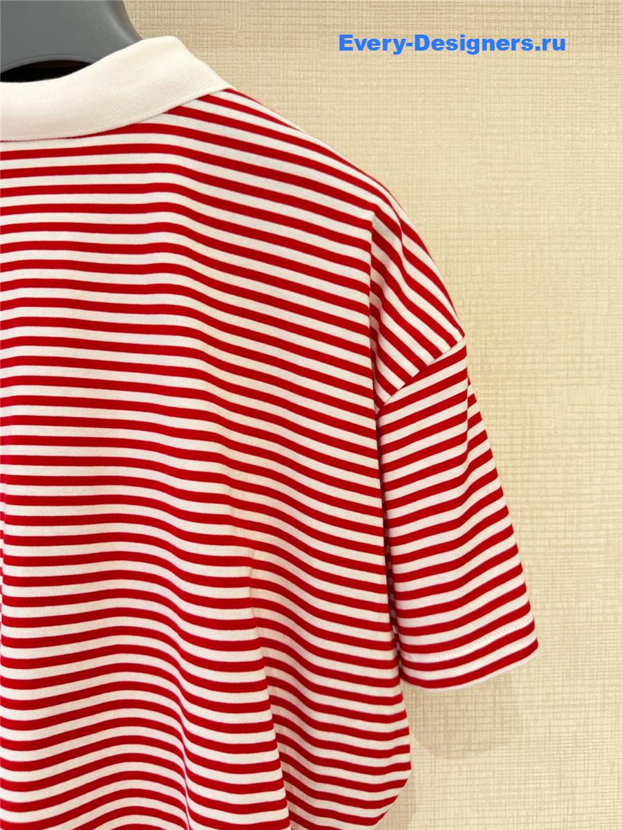 Pra*a red striped polo shirt