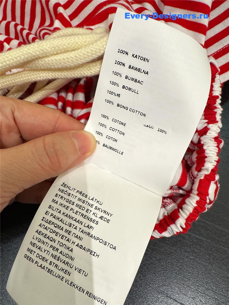 Pra*a red striped polo shirt