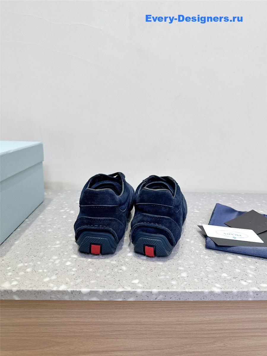 Pra*a dark blue suede sneakers
