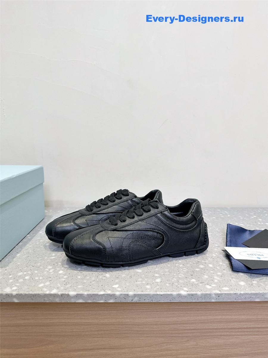 Pra*a black leather low-top sneakers
