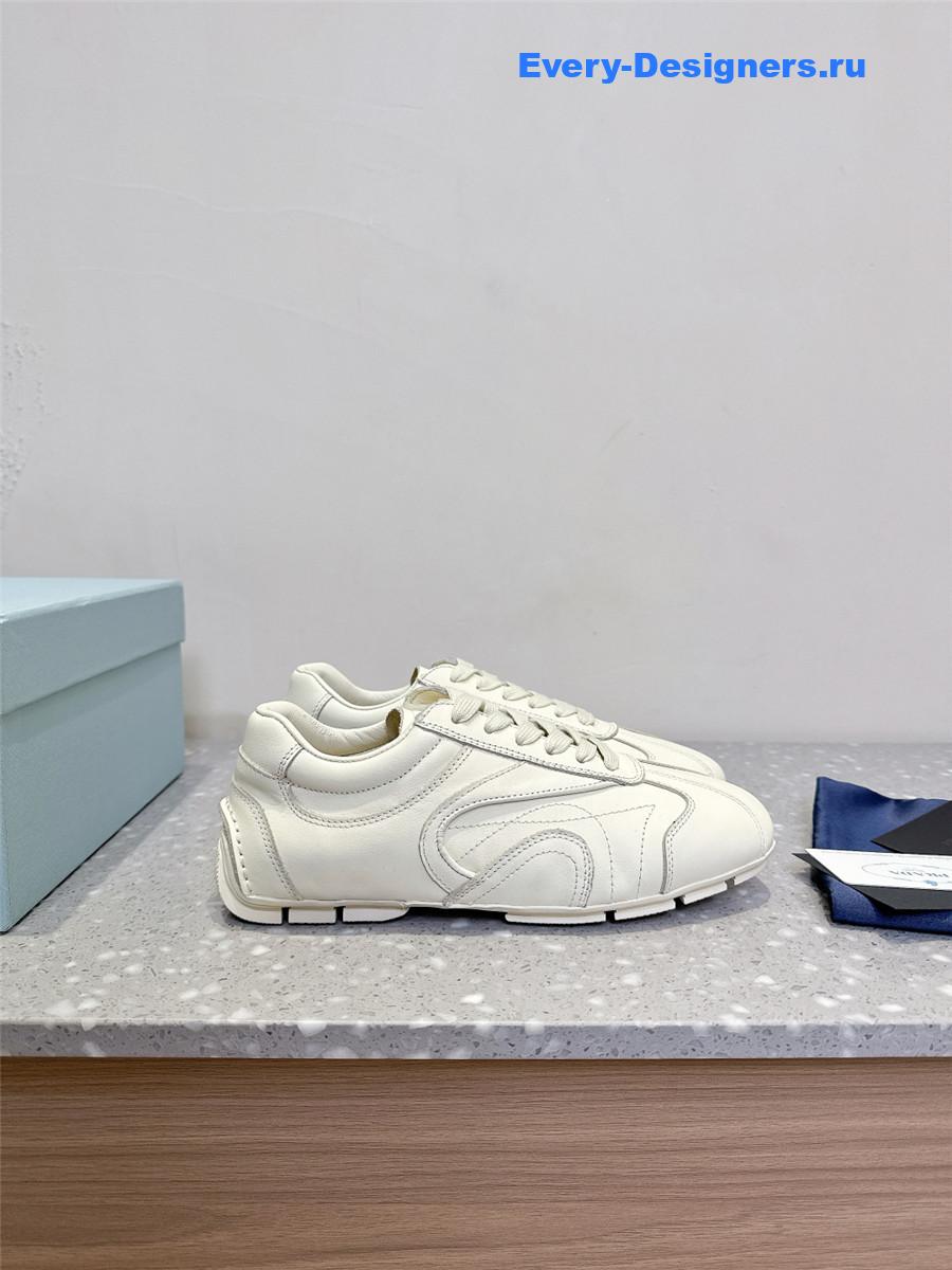 Pra*a white leather low-top sneakers
