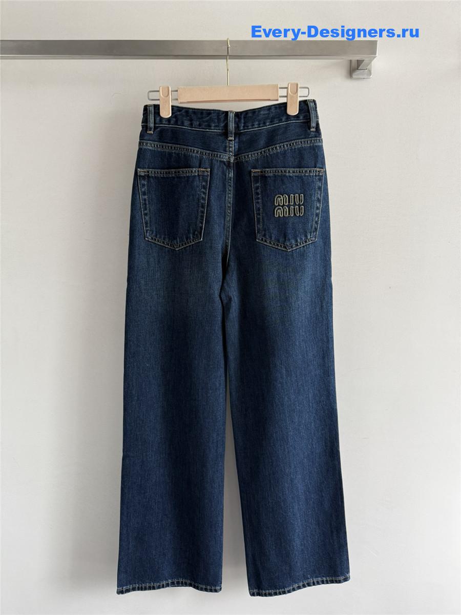 Miu Miu Washed Jeans with Embroidered Logo