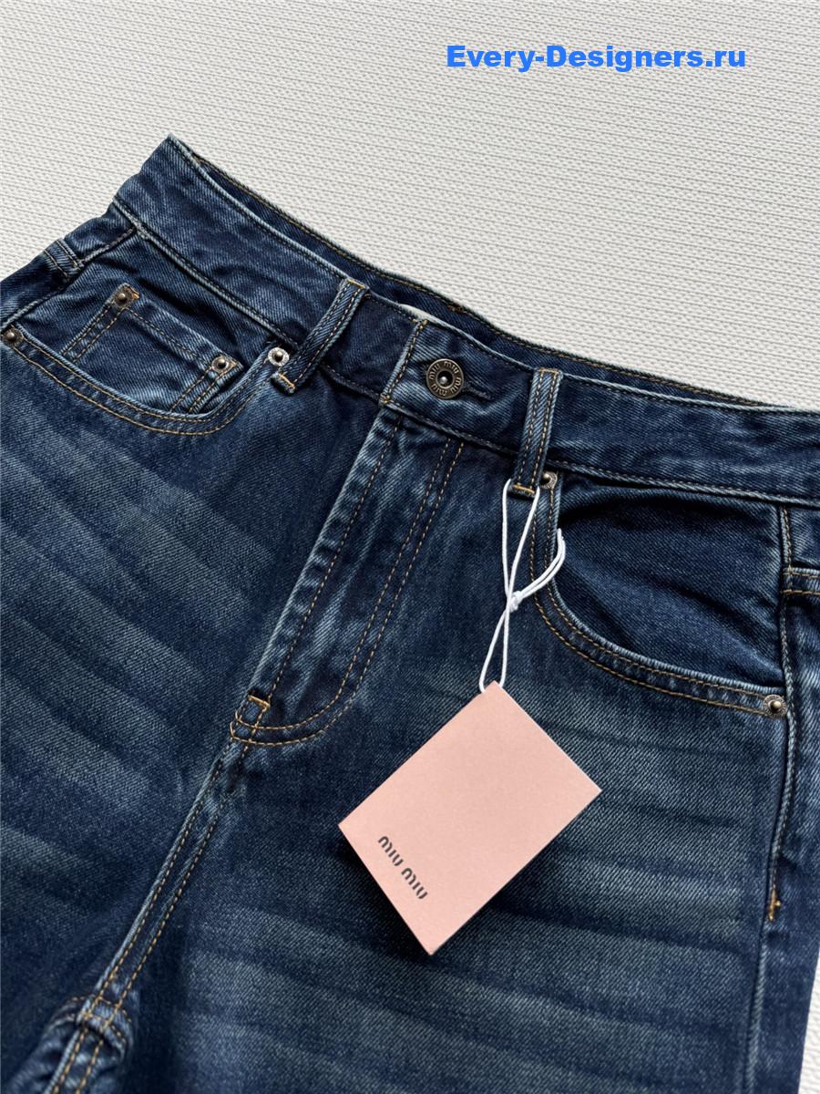 Miu Miu Washed Jeans with Embroidered Logo