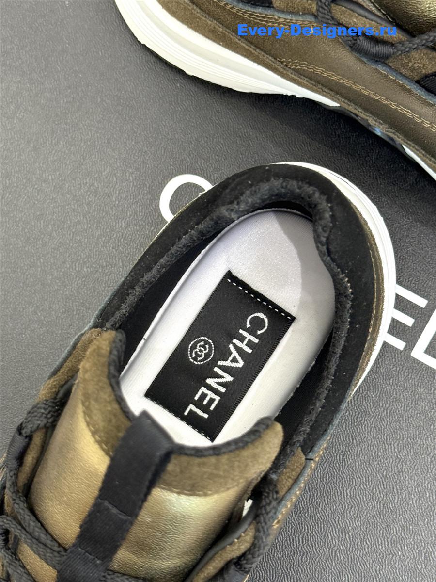 Ch**el laminated calfskin suede gold trainers