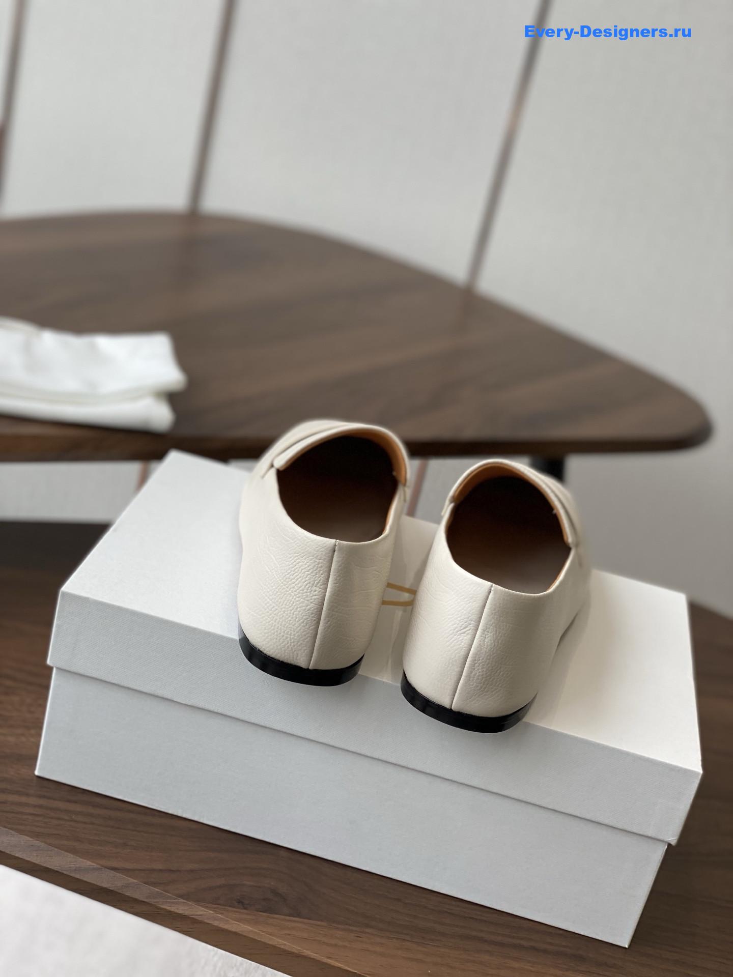 The R0w white leather loafers