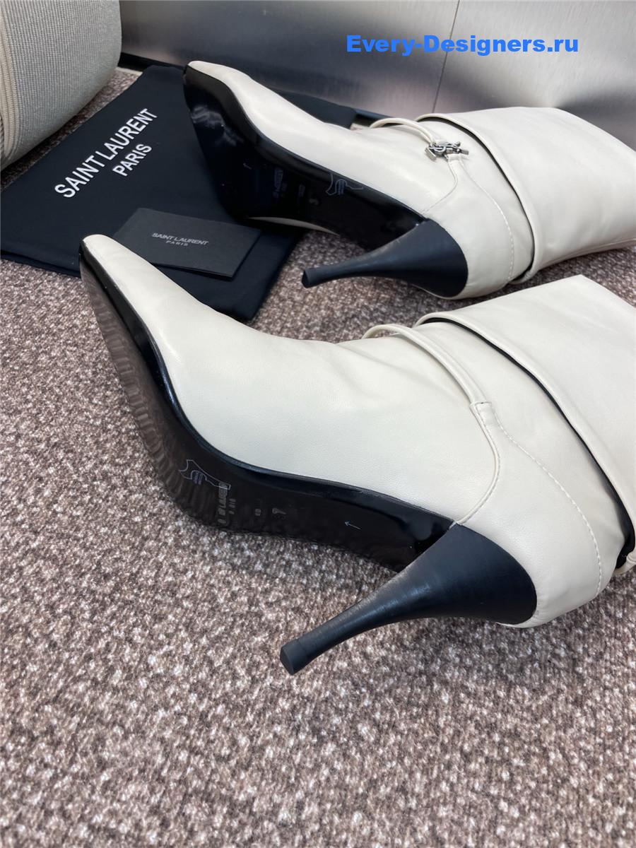 Sa1nt Lau*nt white buckle ankle boots