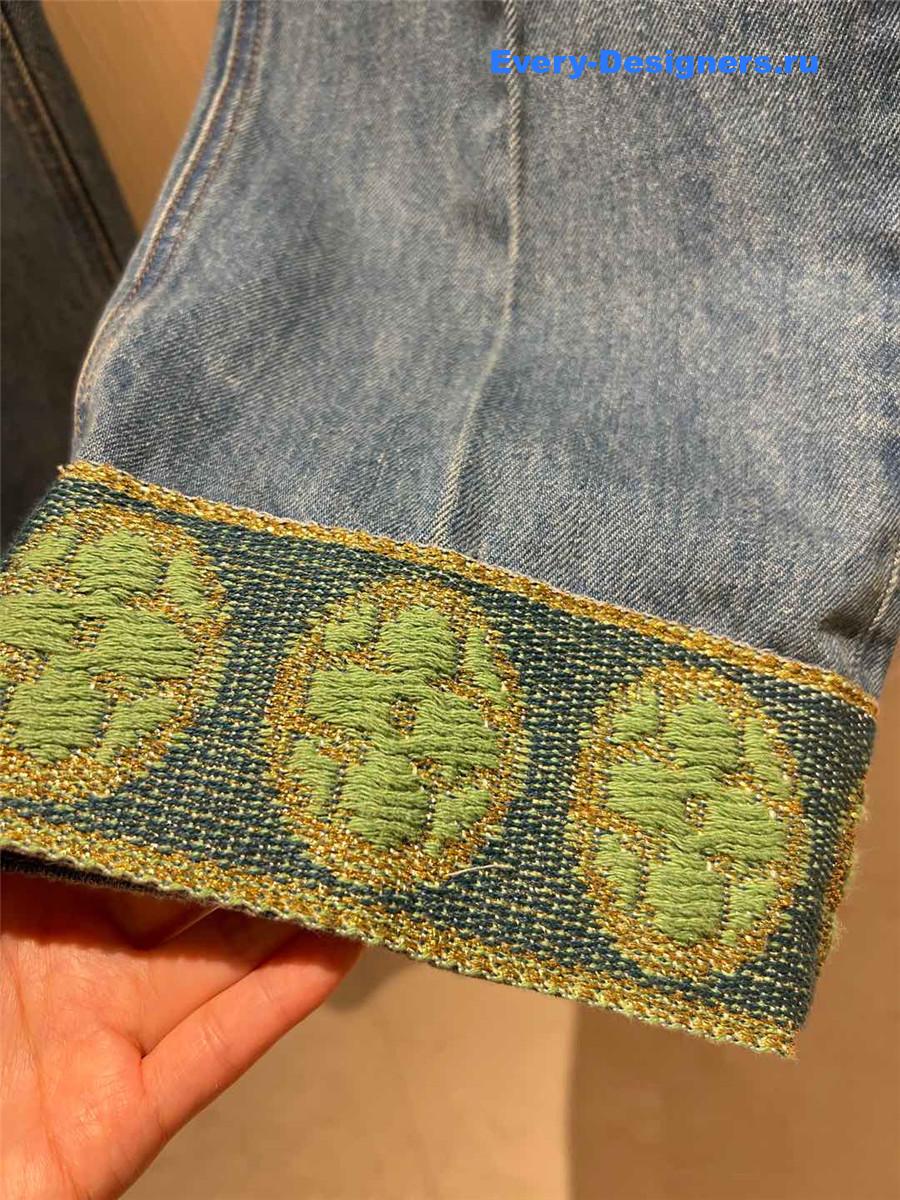 Va1e*ntin0 jacquard-trimmed wide-leg jeans