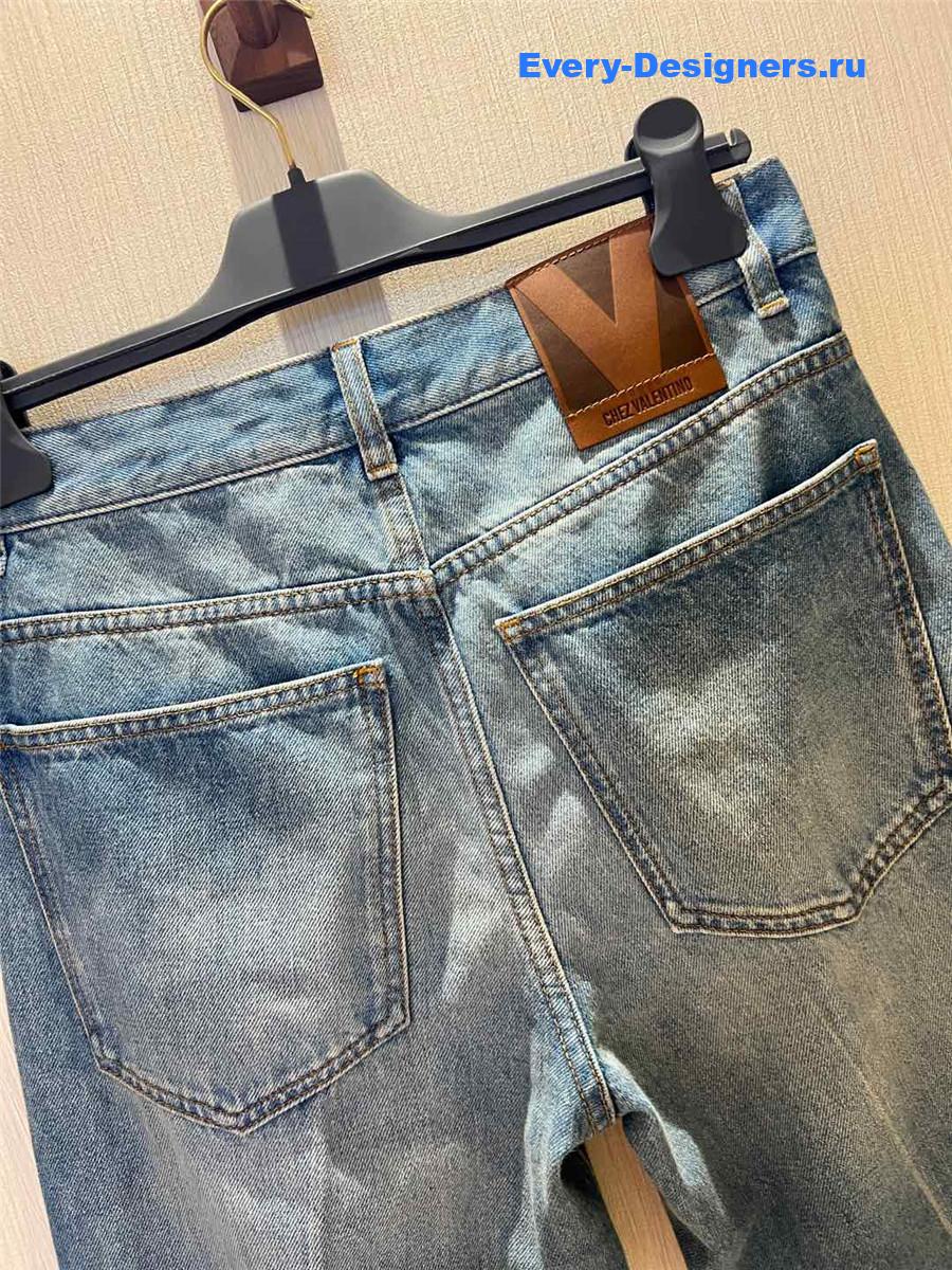 Va1e*ntin0 jacquard-trimmed wide-leg jeans