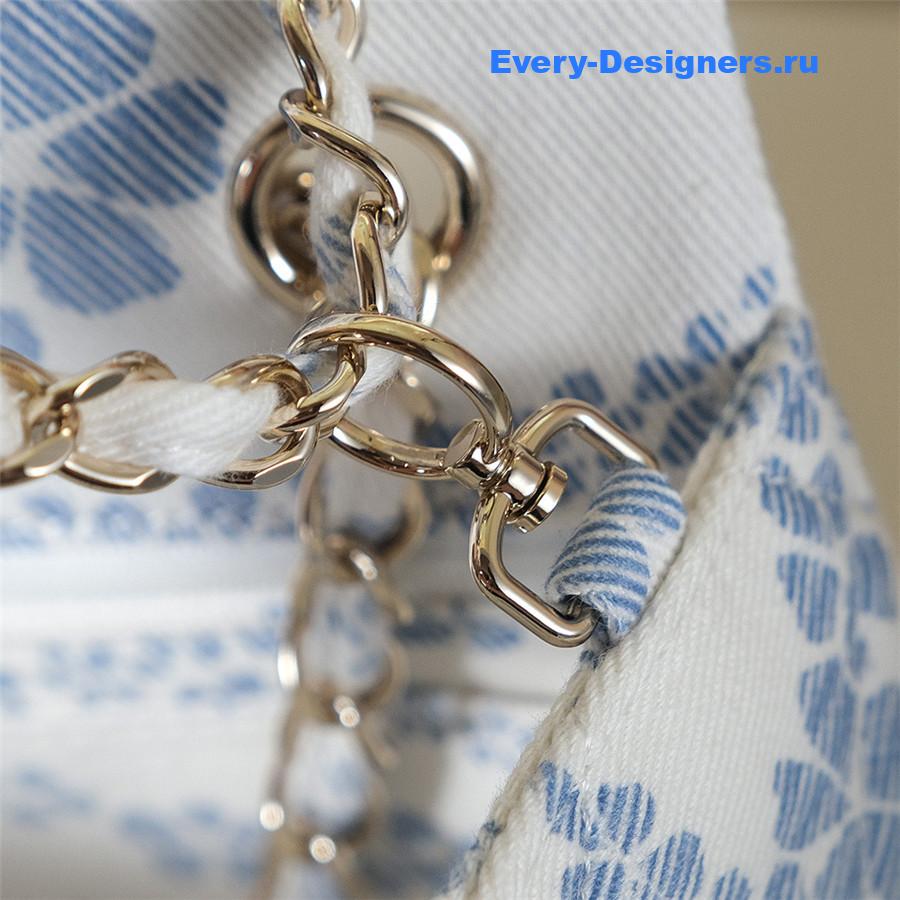 Ch**el white & blue denim hobo bag