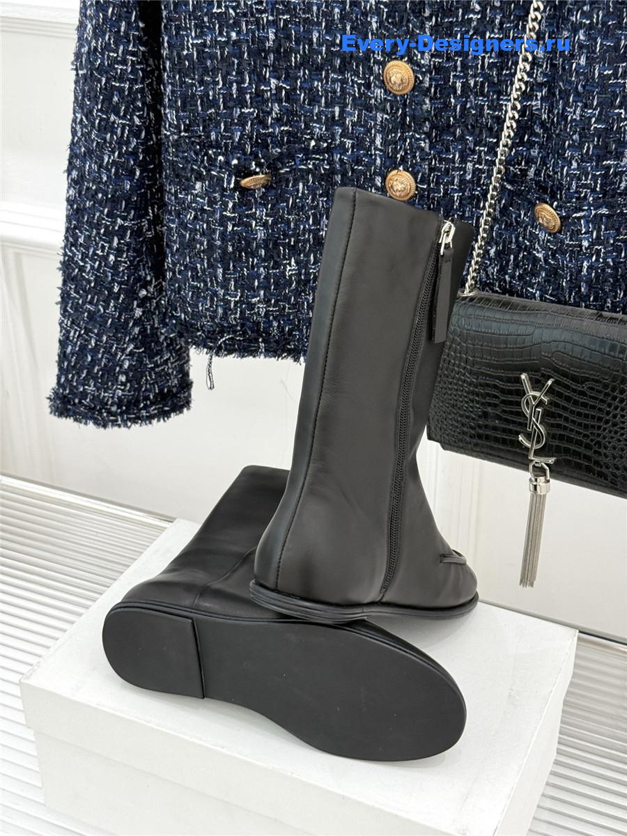 The R0w black canal ankle boots