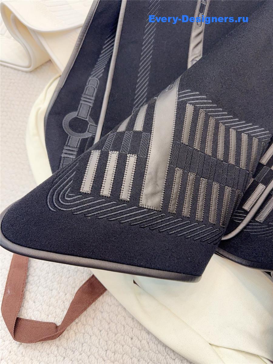 H**me5 black embroidered leather cape