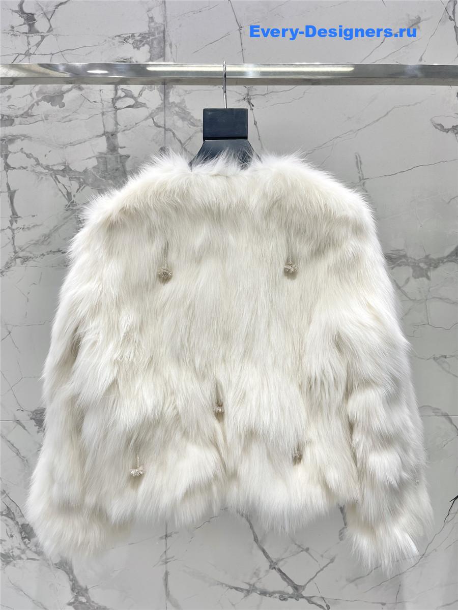 Sa1nt Lau*nt white faux fur coats