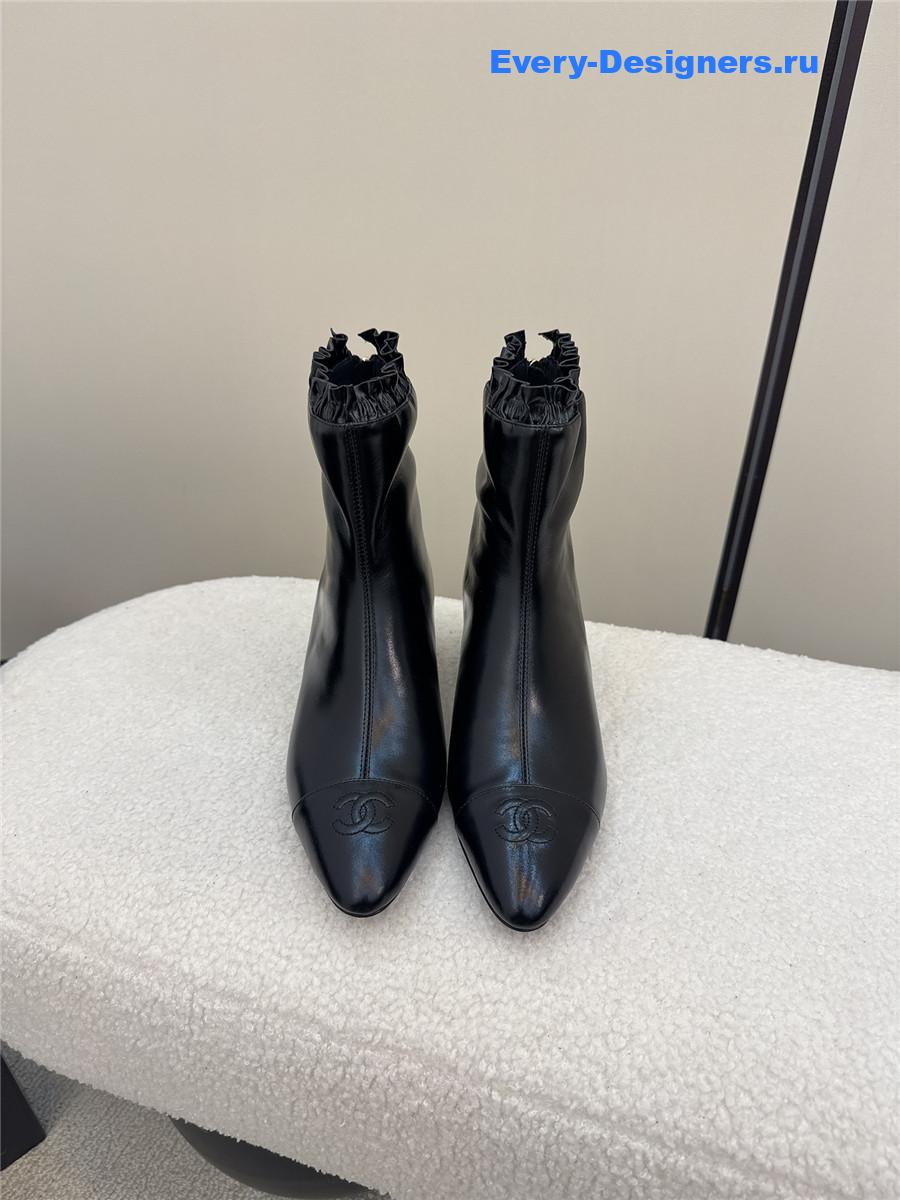 Ch**el black pointed wedge ankle boots