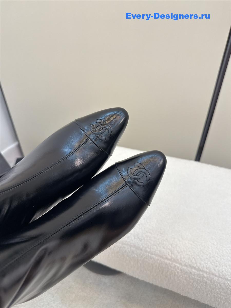 Ch**el black pointed wedge ankle boots