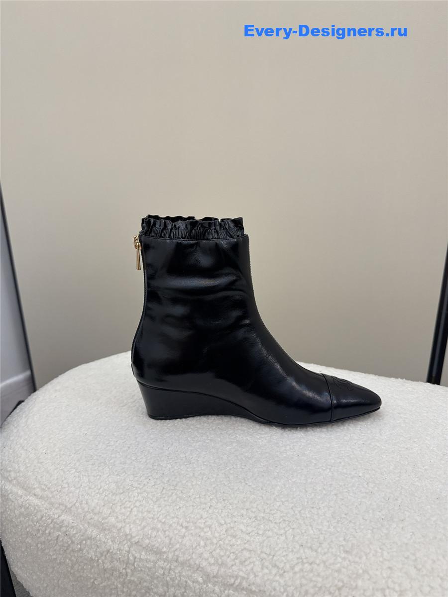 Ch**el black pointed wedge ankle boots