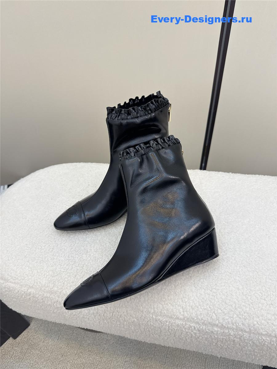 Ch**el black pointed wedge ankle boots