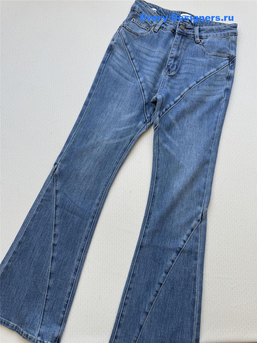 Sa1nt Lau*nt straight-leg flared jeans