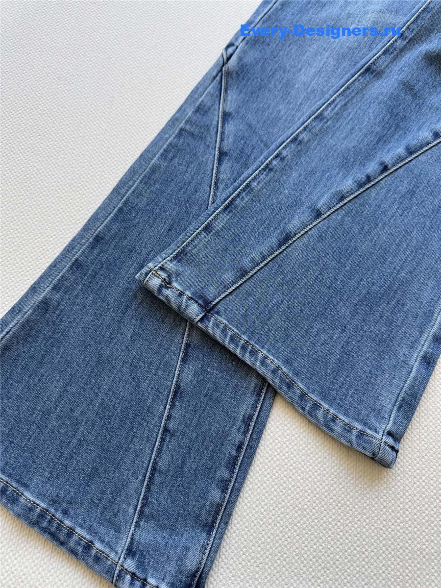 Sa1nt Lau*nt straight-leg flared jeans