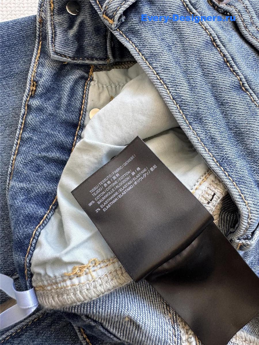 Sa1nt Lau*nt straight-leg flared jeans