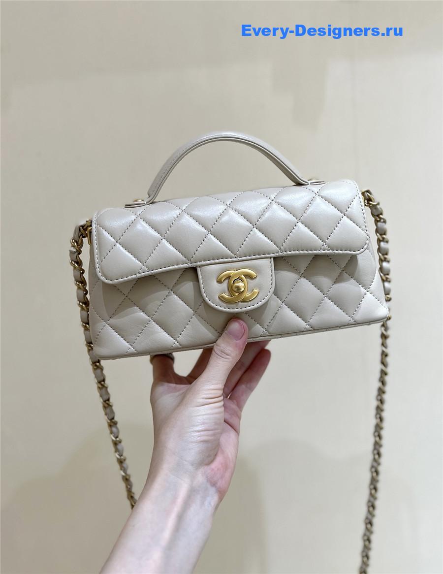 Ch**el beige lambskin top handle flap bag