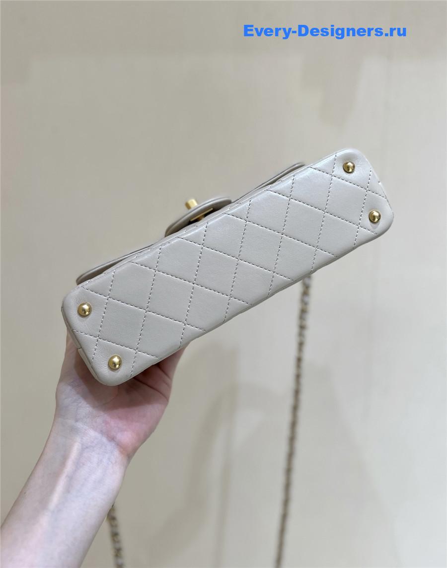 Ch**el beige lambskin top handle flap bag