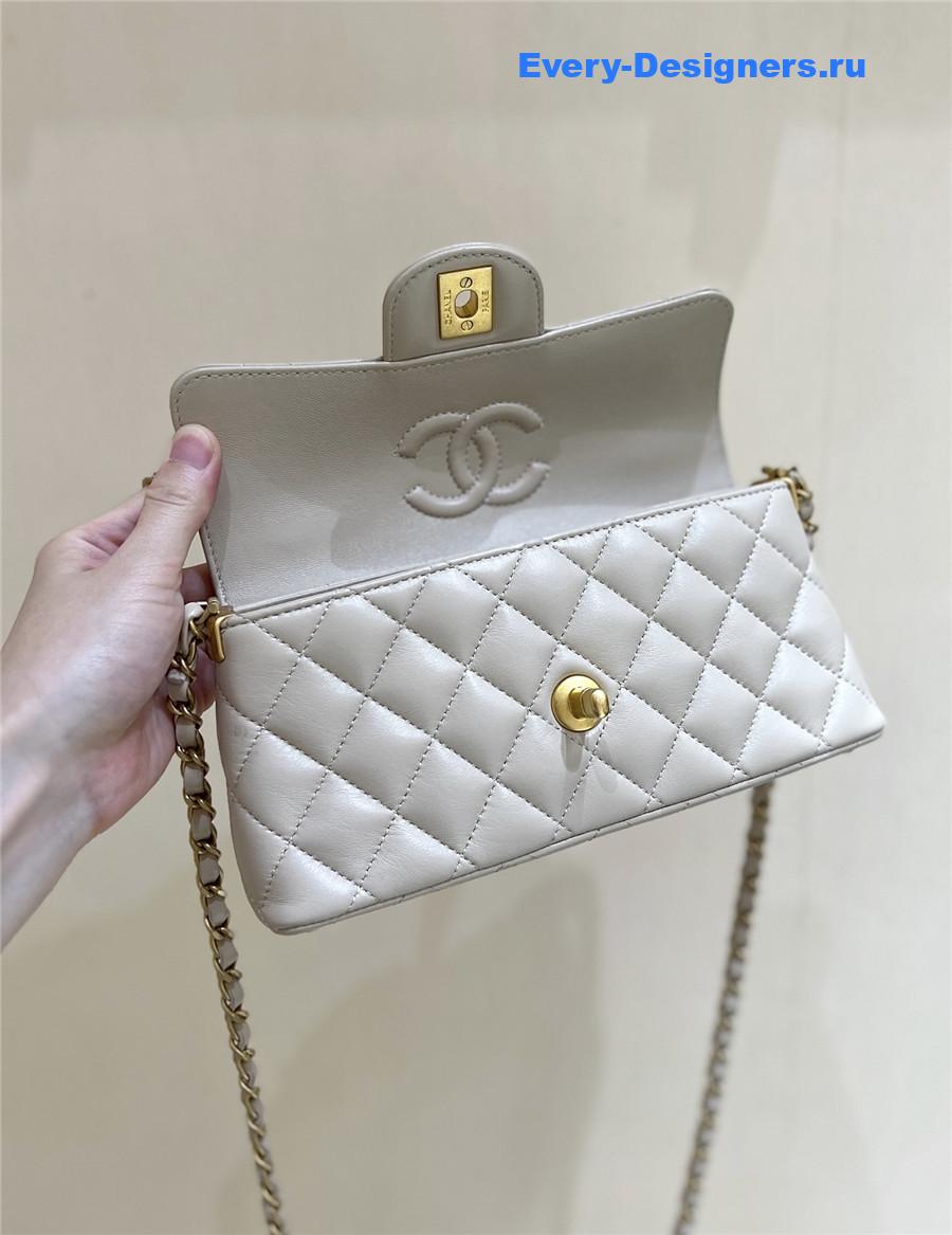 Ch**el beige lambskin top handle flap bag