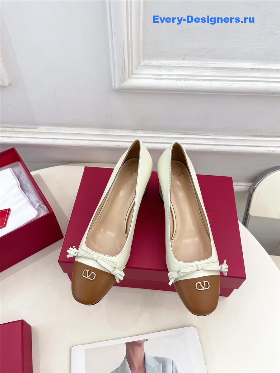 Va1e*ntin0 garavani white mid-heel pumps