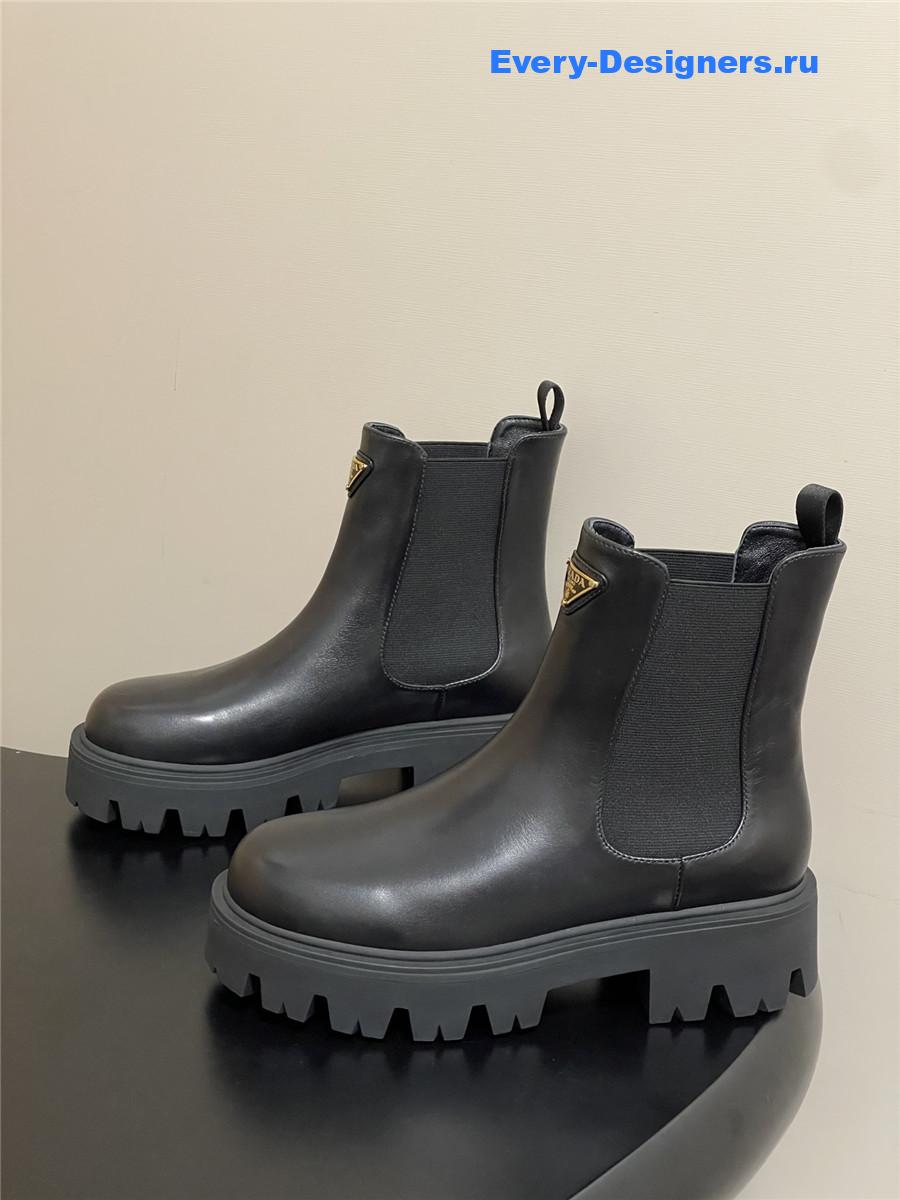 Pra*a black monolith brushed leather booties