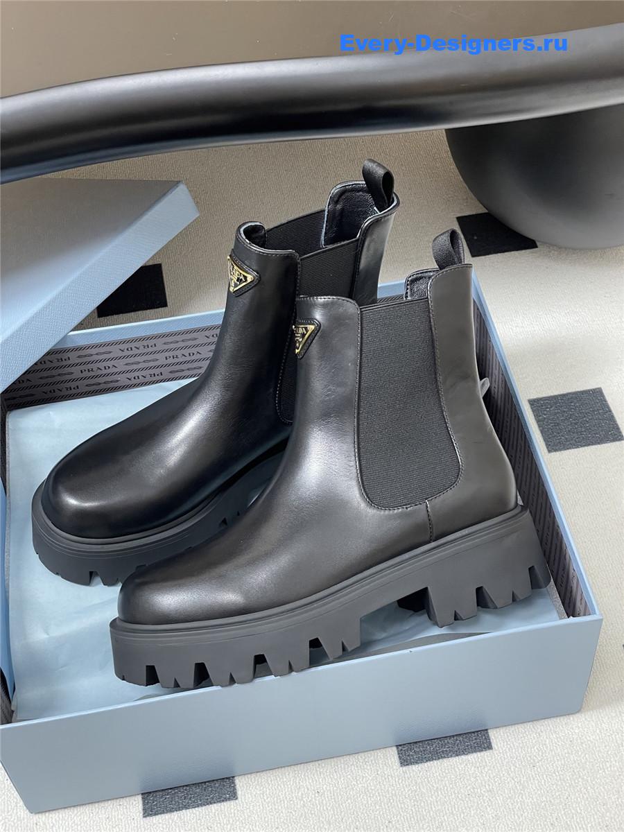 Pra*a black monolith brushed leather booties