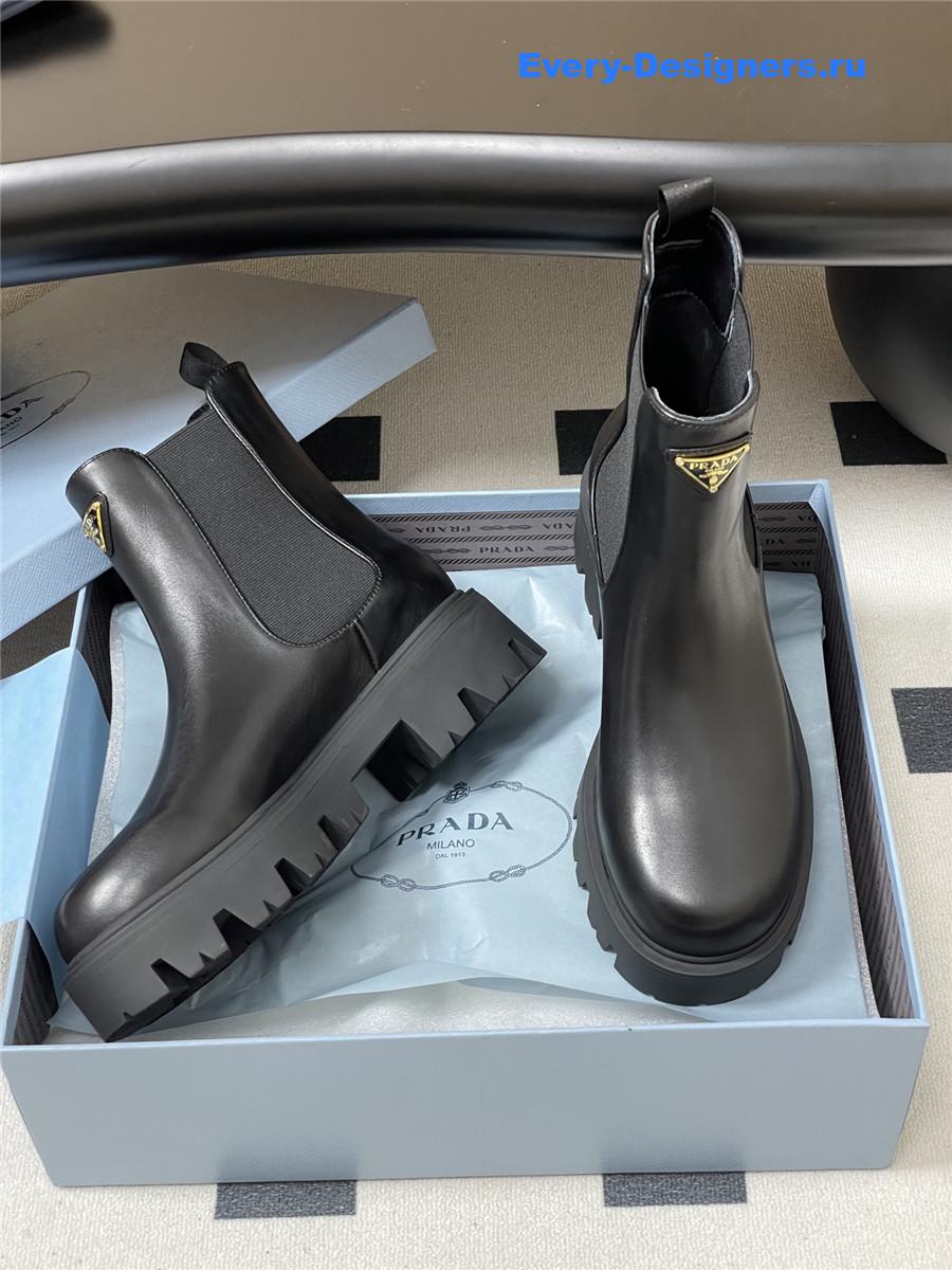 Pra*a black monolith brushed leather booties