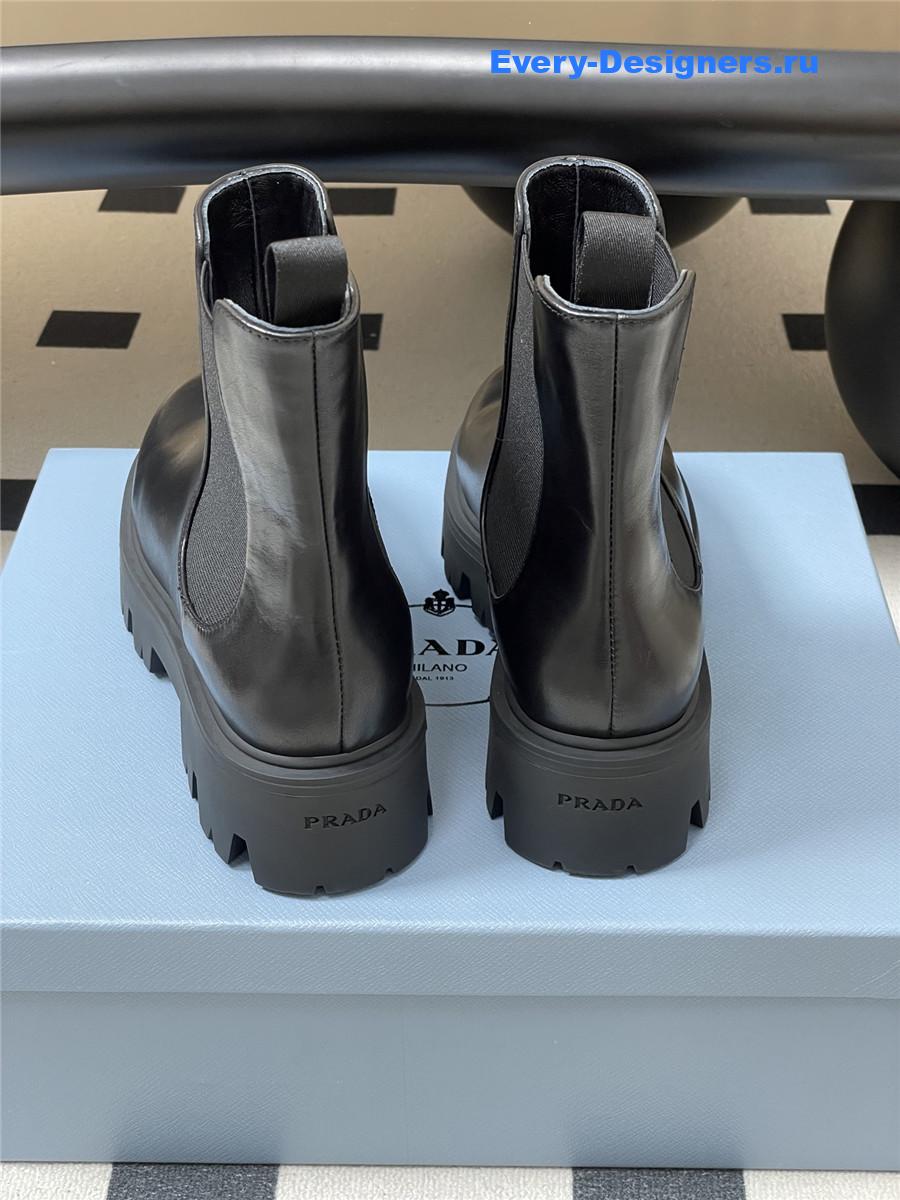 Pra*a black monolith brushed leather booties