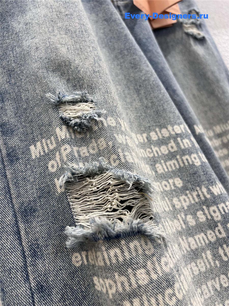 Miu Miu Lettering Print Ripped Denim Jeans