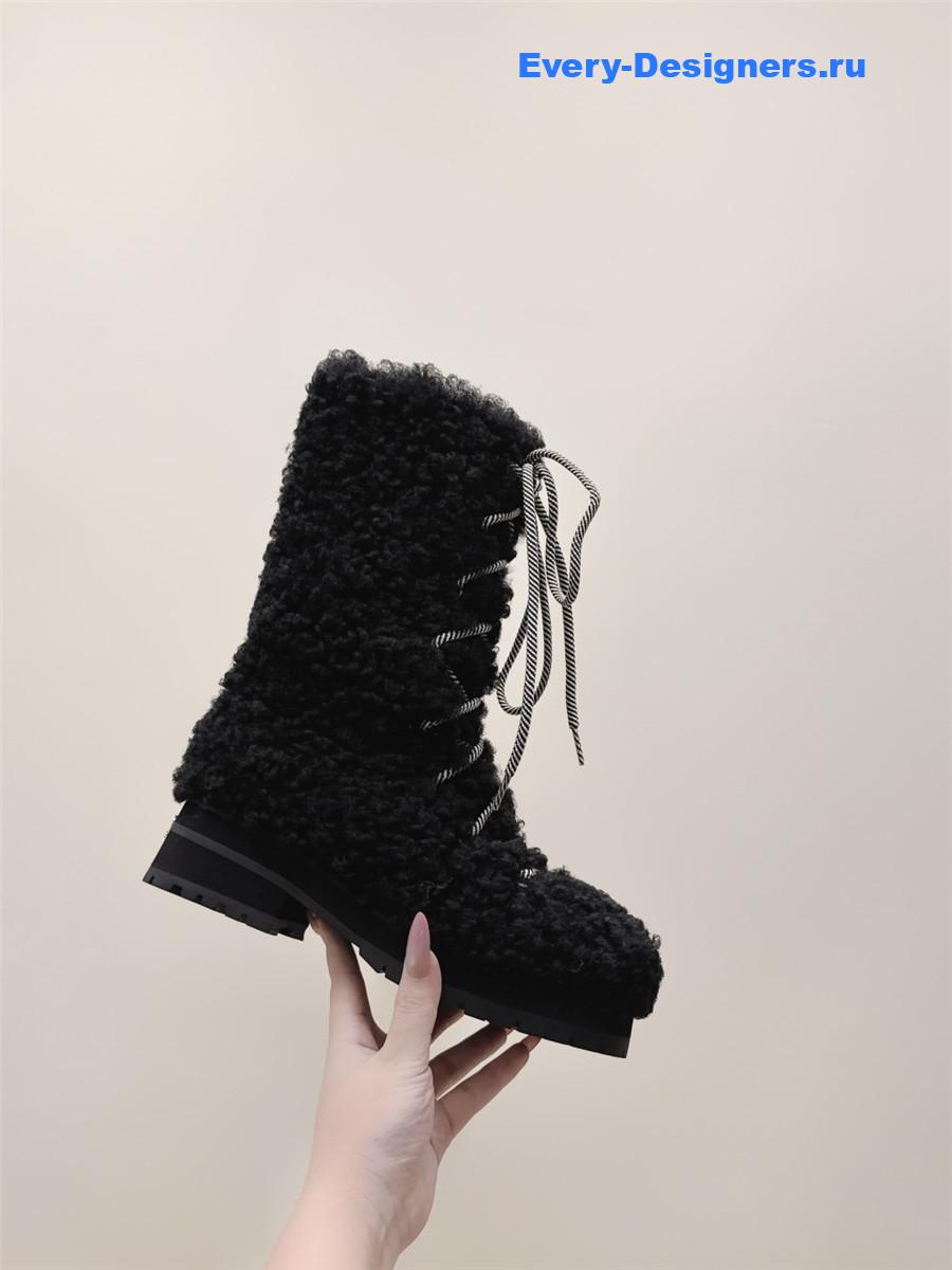Ch**el lambswool black snow boots