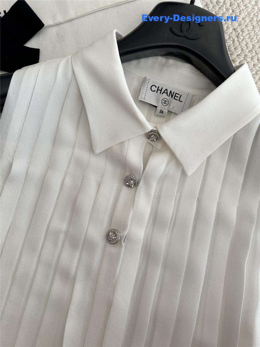 Ch**el white pleated sleeveless top