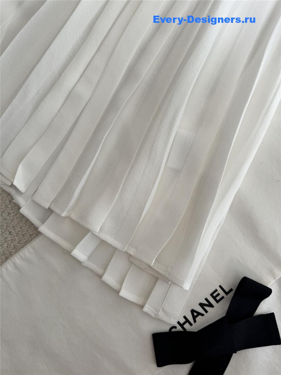 Ch**el white pleated sleeveless top